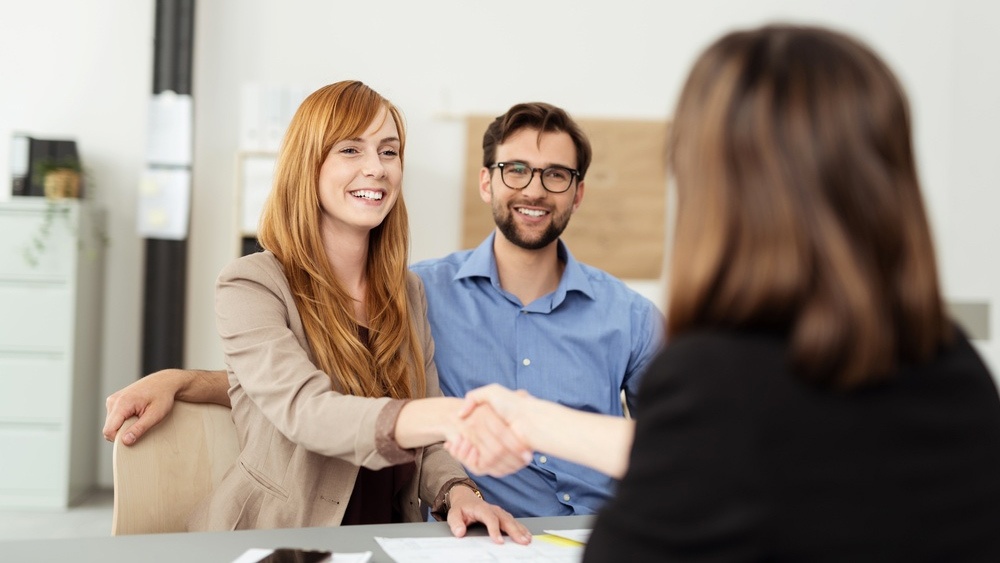 happy-couple-handshake